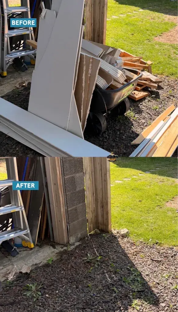 Construction debris removed from beside a shed